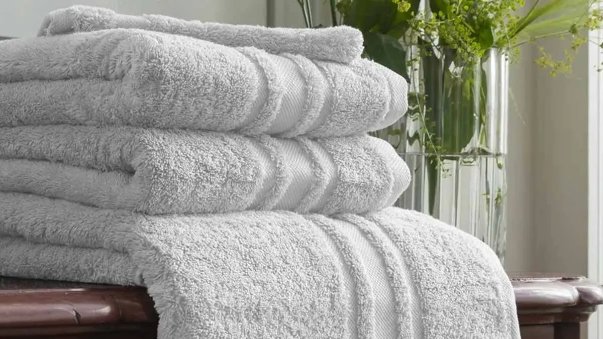 The hidden job of small fabric straps on bath towels